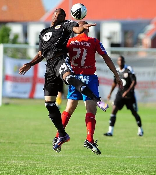 Bristol Citys Marlon Jackson challenges for the ariel ball