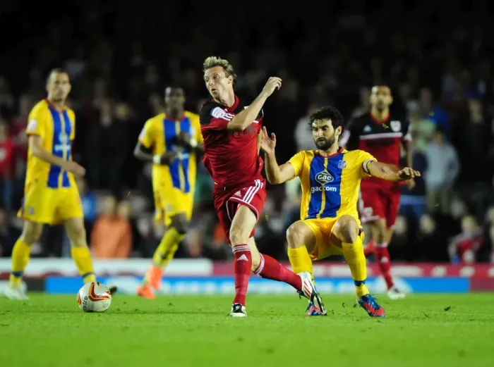 Framed Print : Bristol City's Martyn Woolford Foul by Mile Jedinak during Bristol City vs Crystal Palace Championship Match Framed Print : Bristol City's Martyn Woolford Foul by Mile Jedinak during Bristol City vs Crystal Palace Championship Match