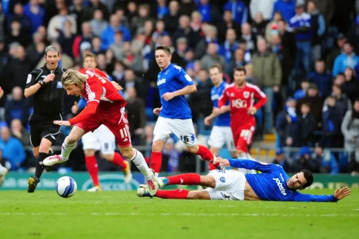 Framed Print : Bristol City's Martyn Woolford Fouled by Portsmouth's Ricardo Rocha During Match, Fratton Park, 2012 Framed Print : Bristol City's Martyn Woolford Fouled by Portsmouth's Ricardo Rocha During Match, Fratton Park, 2012