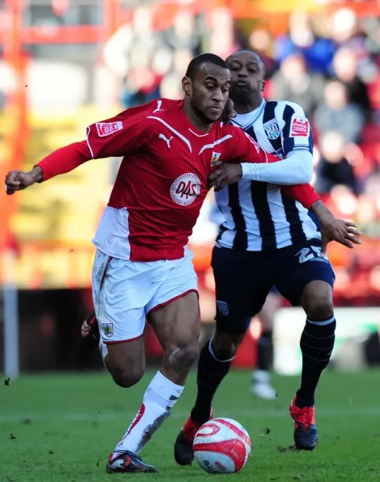 Framed Print : Bristol City's Marvin Elliott Fends Off Joss Labadie in Championship Clash vs. West Bromwich Albion (21 / 02 / 2010) Framed Print : Bristol City's Marvin Elliott Fends Off Joss Labadie in Championship Clash vs. West Bromwich Albion (21 / 02 / 2010)