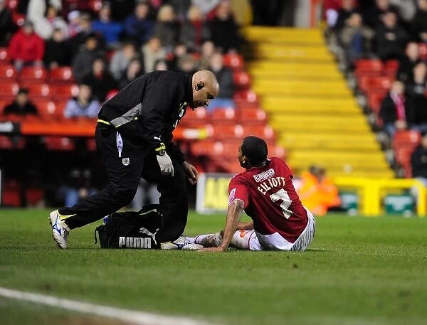 Bristol City's Marvin Elliott Receives Treatment During Championship Match vs Barnsley (23 / 03 / 2010)