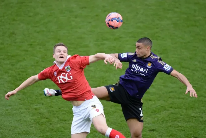 Framed Print : Bristol City's Matt Smith Battles for High Ball Against West Ham's Winston Reid during FA Cup Fourth Round Framed Print : Bristol City's Matt Smith Battles for High Ball Against West Ham's Winston Reid during FA Cup Fourth Round
