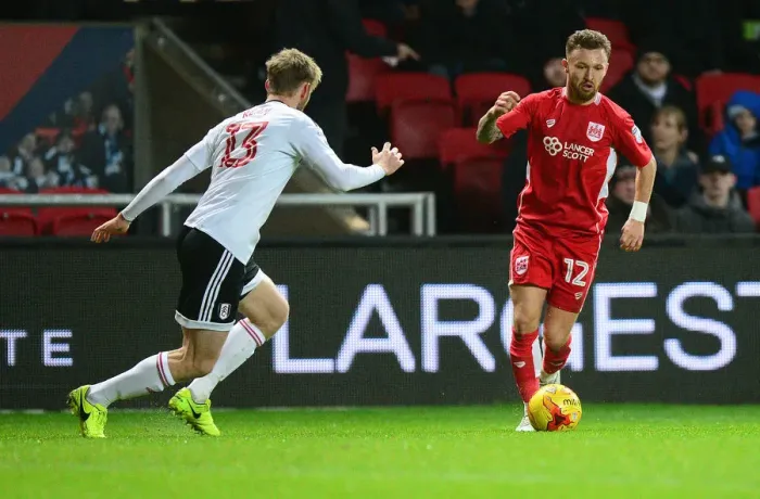Framed Print : Bristol City's Matty Taylor Charges Forward Against Fulham in Sky Bet Championship Clash