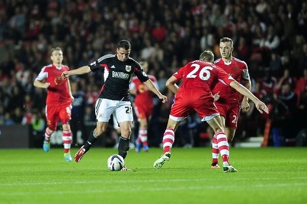 Bristol City's McLaughlin Charges Past Hooiveld in Southampton Showdown