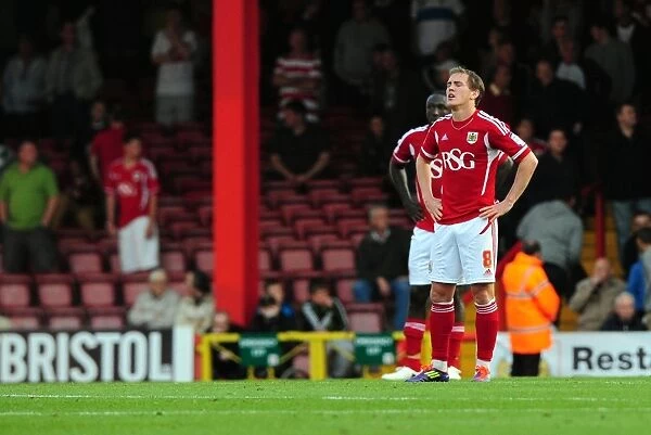 Bristol City's Neil Kilkenny Disappointed After Conceding Goal vs. Peterborough United (15 / 10 / 2011, Championship)