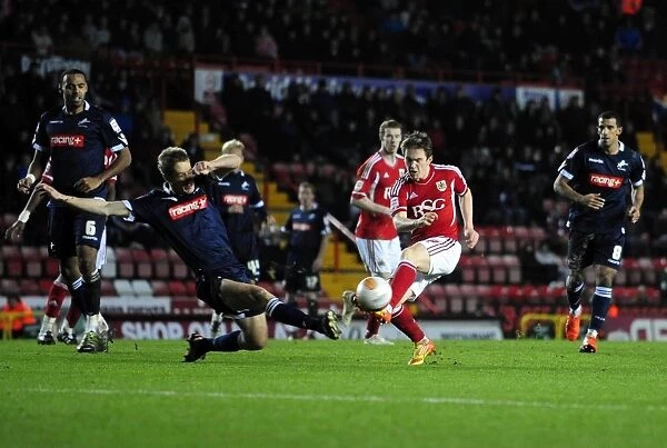 Bristol City's Neil Kilkenny Shoots in Championship Match against Millwall (03 / 01 / 2012)