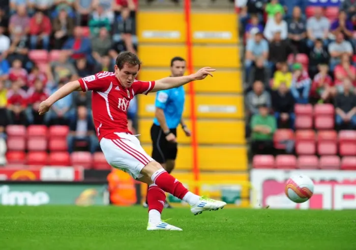 Framed Print : Bristol City's Neil Kilkenny Shoots from Distance in Championship Match against Brighton (10-09-2011) Framed Print : Bristol City's Neil Kilkenny Shoots from Distance in Championship Match against Brighton (10-09-2011)