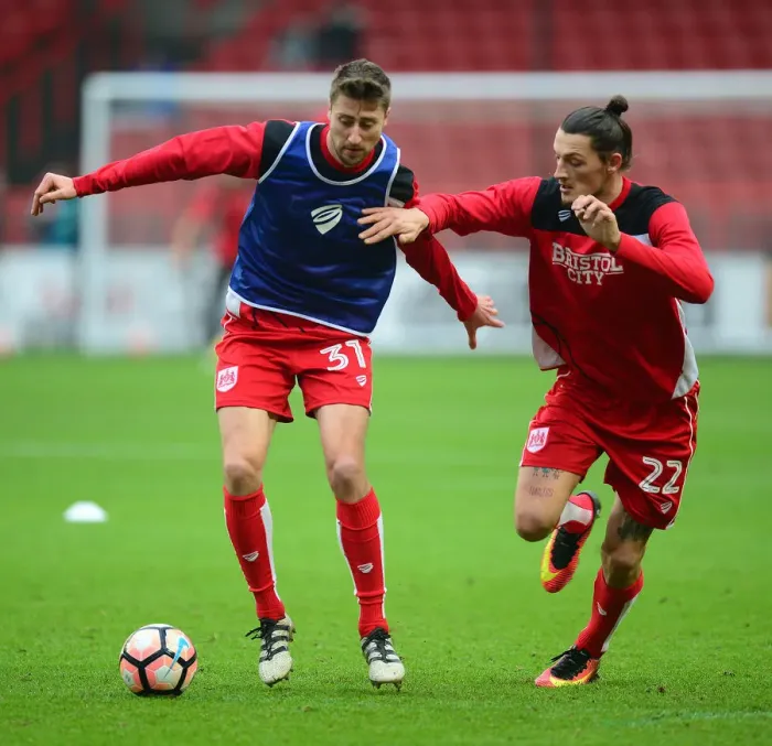 Framed Print : Bristol City's New Signings Jens Hegeler and Milan Djuric Warm Up Ahead of FA Cup Clash with Fleetwood Town Framed Print : Bristol City's New Signings Jens Hegeler and Milan Djuric Warm Up Ahead of FA Cup Clash with Fleetwood Town