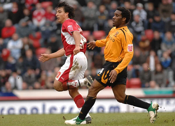 Bristol City's Nick Carle Battles for Possession Against Hull City