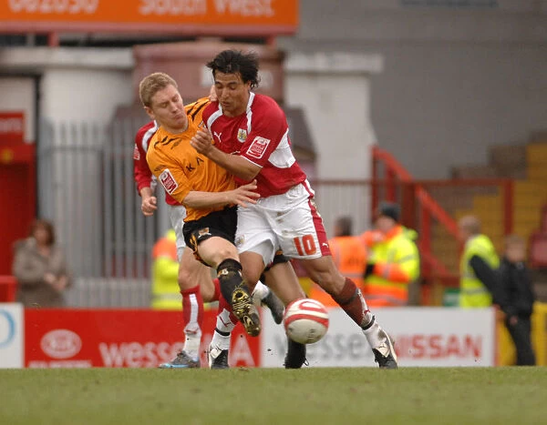 Bristol City's Nick Carle Battles for Possession against Hull City