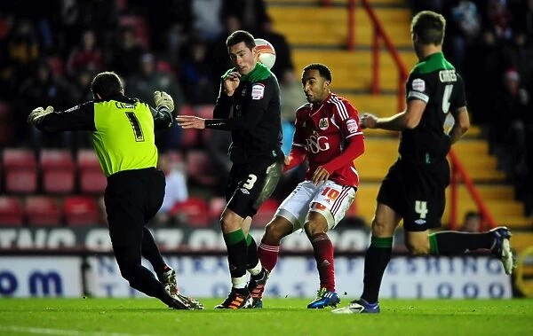 Bristol City's Nicky Maynard Fights for Possession in Championship Match