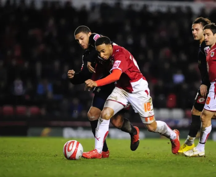 Framed Print : Bristol City's Nicky Maynard Fights for Possession Against Barnsley in Championship Match, 2010 Framed Print : Bristol City's Nicky Maynard Fights for Possession Against Barnsley in Championship Match, 2010