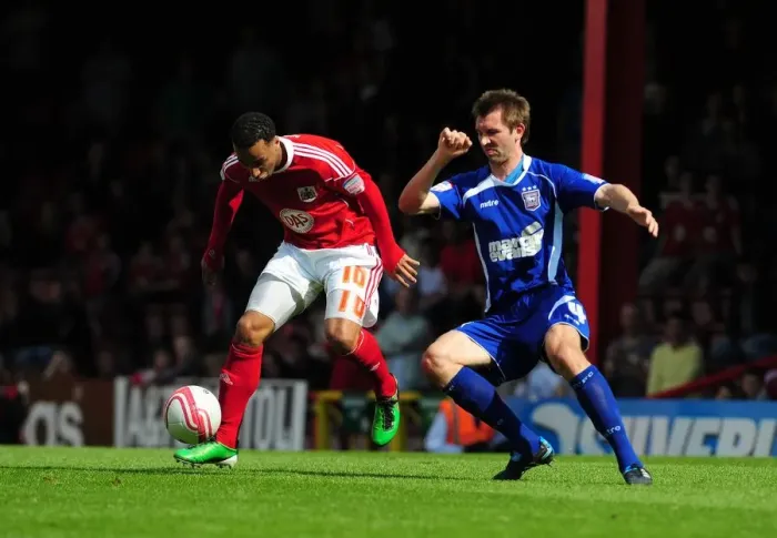Framed Print : Bristol City's Nicky Maynard Holds Off Ipswich's Gareth McAuley in Championship Clash at Ashton Gate Stadium (16-Apr-2011) Framed Print : Bristol City's Nicky Maynard Holds Off Ipswich's Gareth McAuley in Championship Clash at Ashton Gate Stadium (16-Apr-2011)