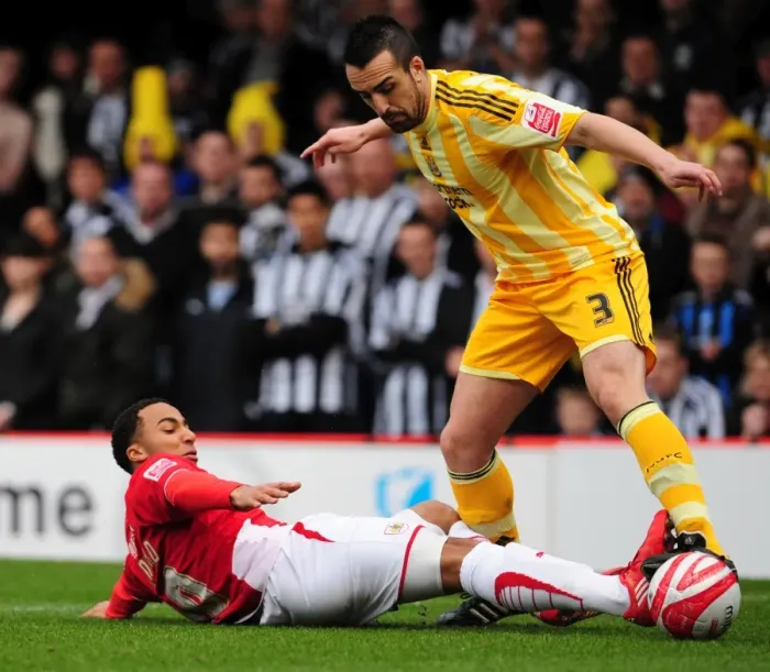 Framed Print : Bristol City's Nicky Maynard vs. Newcastle United's Jose Enrique - Intense Battle for the Ball (Championship 2010) Framed Print : Bristol City's Nicky Maynard vs. Newcastle United's Jose Enrique - Intense Battle for the Ball (Championship 2010)