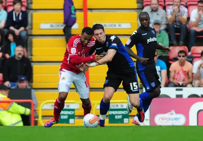 Framed Print : Bristol City's Nicky Maynard vs. Portsmouth's Greg Halford: Championship Clash at Ashton Gate Stadium (200811) Framed Print : Bristol City's Nicky Maynard vs. Portsmouth's Greg Halford: Championship Clash at Ashton Gate Stadium (200811)