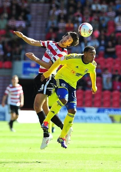Bristol City's Nicky Maynard vs. Doncaster Rovers George Friend in League Cup Clash - 27 / 08 / 2011