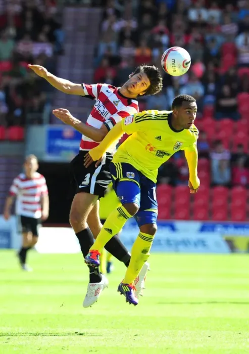 Framed Print : Bristol City's Nicky Maynard vs. Doncaster Rovers George Friend in League Cup Clash - 27 / 08 / 2011 Framed Print : Bristol City's Nicky Maynard vs. Doncaster Rovers George Friend in League Cup Clash - 27 / 08 / 2011