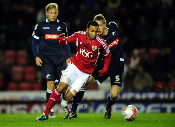 Framed Print : Bristol City's Nicky Maynard vs. Millwall's Paul Robinson - Championship Clash at Ashton Gate Stadium, January 3, 2012