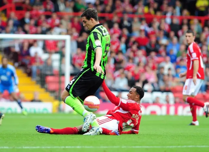 Framed Print : Bristol City's Nicky Maynard vs Brighton's Lewis Dunk: Intense Championship Tackle, September 10, 2011 - Editorial Use Only Framed Print : Bristol City's Nicky Maynard vs Brighton's Lewis Dunk: Intense Championship Tackle, September 10, 2011 - Editorial Use Only