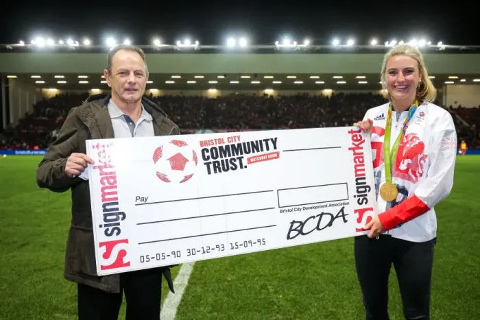 Framed Print : Bristol City's Olympic Hero Lily Owsley Presents Half Time Draw Cheque at Ashton Gate Stadium Framed Print : Bristol City's Olympic Hero Lily Owsley Presents Half Time Draw Cheque at Ashton Gate Stadium