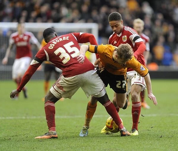 Bristol City's Osborne and Reid Tackle Michael Jacobs in Wolves vs. Bristol City Football Match, Sky Bet League One