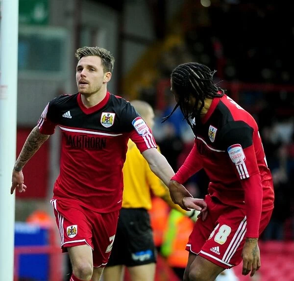 Bristol City's Paul Anderson and Neil Danns Celebrate 1-0 Goal Against Peterborough in Championship Match (December 2012)