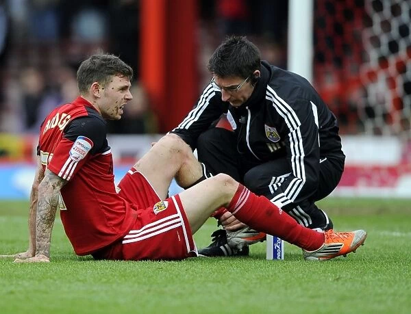 Bristol City's Paul Anderson Receives On-Field Treatment During Championship Match vs Ipswich Town