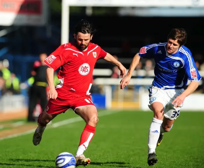 Framed Print : Bristol City's Paul Hartley vs. Peterborough's Josh Simpson: A Championship Battle, March 2010 Framed Print : Bristol City's Paul Hartley vs. Peterborough's Josh Simpson: A Championship Battle, March 2010