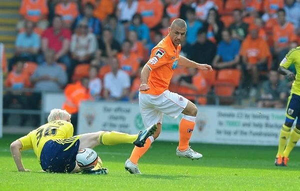 Bristol City's Ryan McGivern Tackles Kevin Phillips in League Cup Clash at Blackpool - 01 / 10 / 2011