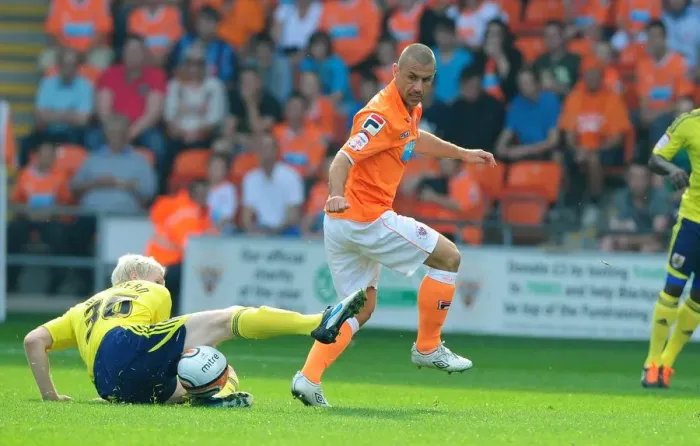 Framed Print : Bristol City's Ryan McGivern Tackles Kevin Phillips in League Cup Clash at Blackpool - 01 / 10 / 2011 Framed Print : Bristol City's Ryan McGivern Tackles Kevin Phillips in League Cup Clash at Blackpool - 01 / 10 / 2011