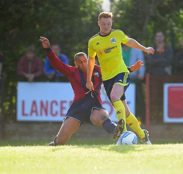 Bristol City's Ryan Taylor in Intense Face-off during Pre-Season Friendly