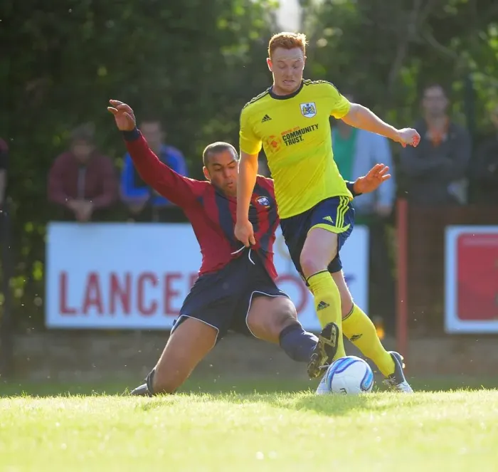Framed Print : Bristol City's Ryan Taylor in Intense Face-off during Pre-Season Friendly Framed Print : Bristol City's Ryan Taylor in Intense Face-off during Pre-Season Friendly