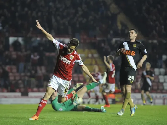Framed Print : Bristol City's Sam Baldock Doubles Up: Thrilling Moment from the Ashton Gate Clash against Swindon Town, League One 2014