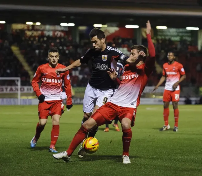 Framed Print : Bristol City's Sam Baldock Faces Off Against Leyton Orient's Gary Sawyer in Sky Bet Football League 1 Clash