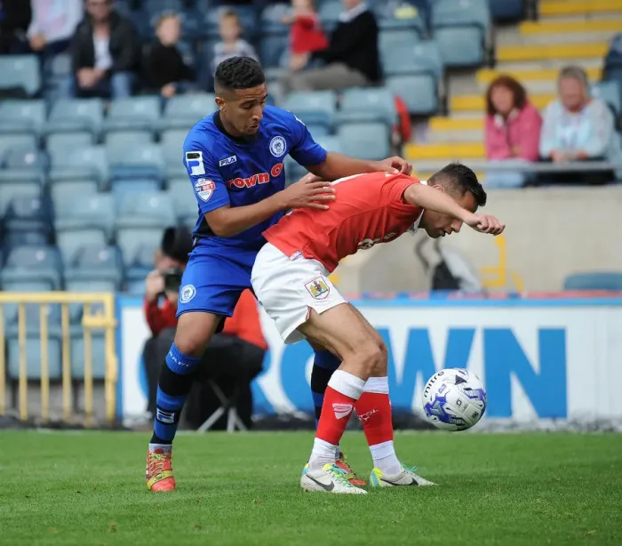 Framed Print : Bristol City's Sam Baldock Faces Off Against Rochdale's Bastien Hery in League One Clash