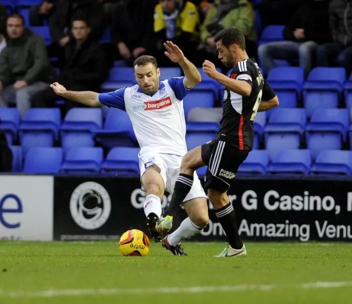 Framed Print : Bristol City's Sam Baldock Faces Off Against Tranmere Defender, Sky Bet League One, 16th November 2013