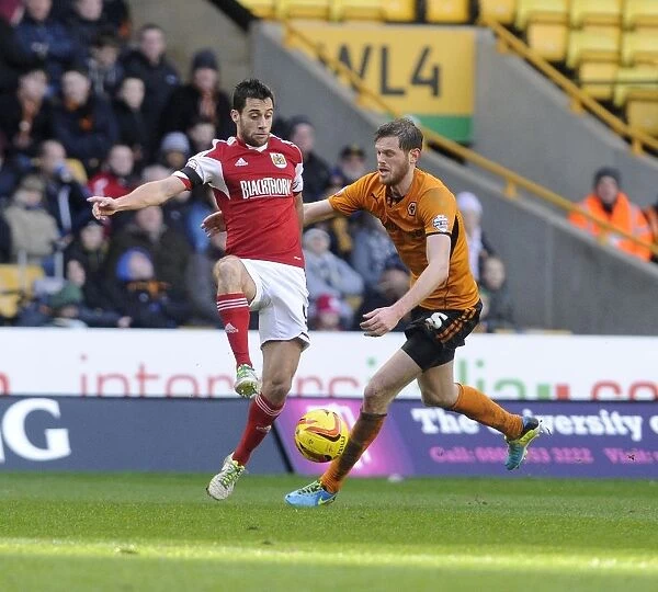 Bristol City's Sam Baldock Faces Pressure from Wolverhampton Wanderers Danny Batth in Sky Bet League One Clash