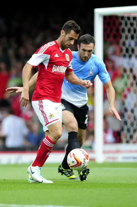 Framed Print : Bristol City's Sam Baldock Fends Off Bradford City's Stephen Darby Pressure in League One Clash at Ashton Gate Framed Print : Bristol City's Sam Baldock Fends Off Bradford City's Stephen Darby Pressure in League One Clash at Ashton Gate