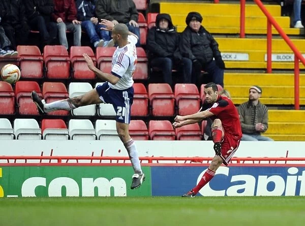 Bristol City's Sam Baldock Goes for Glory: A Thrilling Moment from the Npower Championship Match Against Bolton Wanderers
