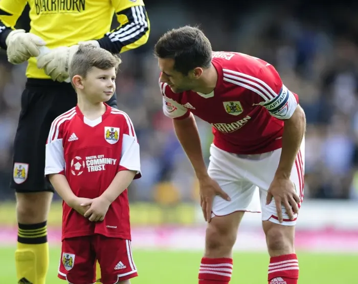Framed Print : Bristol City's Sam Baldock and Mascot Celebrate Victory at Vale Park