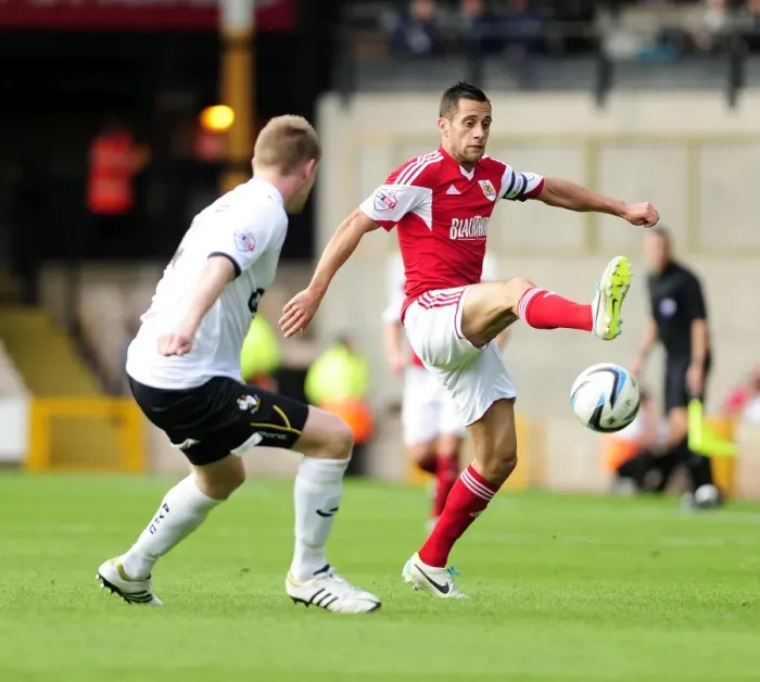 Framed Print : Bristol City's Sam Baldock Reaches for the Ball in Port Vale Showdown Framed Print : Bristol City's Sam Baldock Reaches for the Ball in Port Vale Showdown
