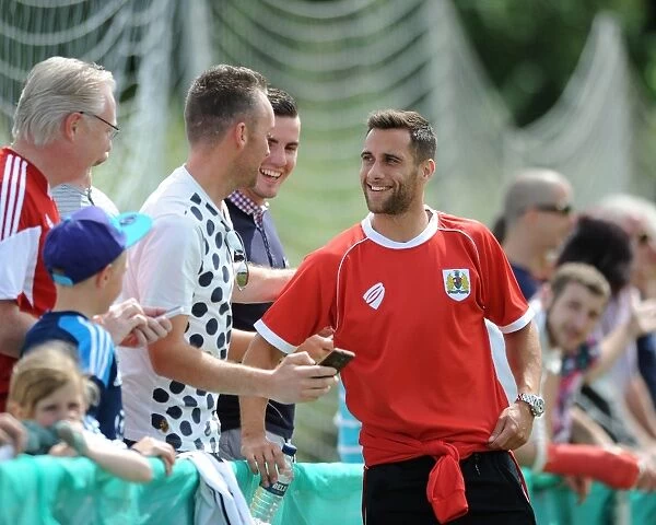 Bristol City's Sam Baldock Shares a Laugh with Fans Before Portishead Town Match, 2014