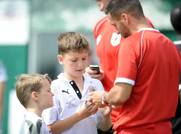 Framed Print : Bristol City's Sam Baldock Signs Autographs at Portishead Town Pre-Season Friendly Framed Print : Bristol City's Sam Baldock Signs Autographs at Portishead Town Pre-Season Friendly