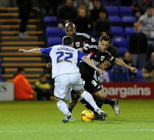 Bristol City's Sam Baldock Tackles Jason Koumas in Sky Bet League One Match (2013)