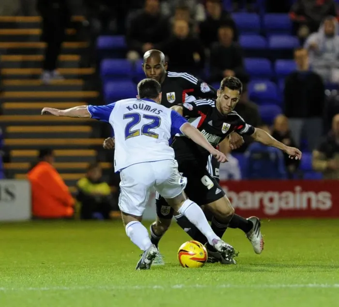 Framed Print : Bristol City's Sam Baldock Tackles Jason Koumas in Sky Bet League One Match (2013) Framed Print : Bristol City's Sam Baldock Tackles Jason Koumas in Sky Bet League One Match (2013)
