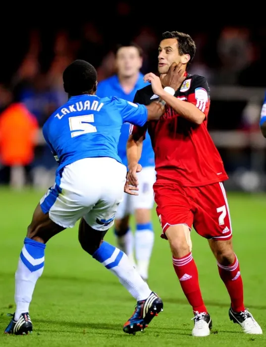 Framed Print : Bristol City's Sam Baldock Throttled by Gabriel Zakuani in Peterborough United Clash