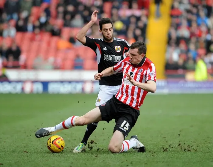 Framed Print : Bristol City's Sam Baldock vs. Sheffield United's Neil Collins - Intense Battle in Sky Bet League One (February 2014)