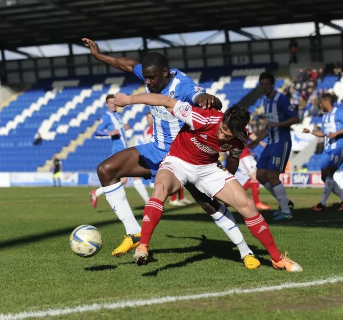 Framed Print : Bristol City's Sam Baldock vs Colchester United's Magnus Okuonghae - Intense Battle for the Ball Framed Print : Bristol City's Sam Baldock vs Colchester United's Magnus Okuonghae - Intense Battle for the Ball