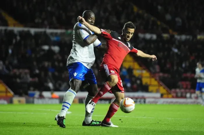Framed Print : Bristol City's Sam Baldock vs Millwall's Danny Shittu: A Battle for Ball Possession in the Championship, October 2012 Framed Print : Bristol City's Sam Baldock vs Millwall's Danny Shittu: A Battle for Ball Possession in the Championship, October 2012