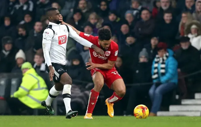 Framed Print : Bristol City's Scott Golbourne Fends Off Abdoul Camara in Derby County Clash